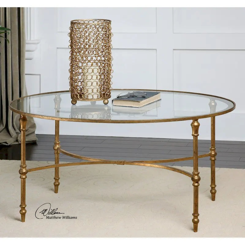 Table basse ovale en verre avec pieds en métal